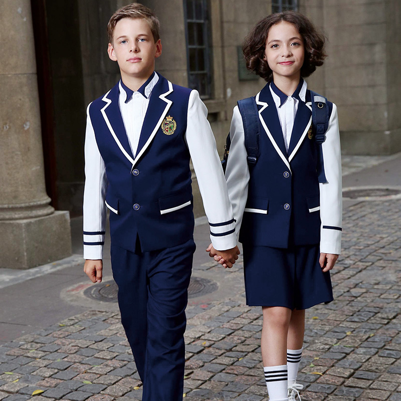 Nuevos diseños, uniformes escolares azul marino de empalme personalizados, conjuntos de chaqueta escolar para niños y niñas 