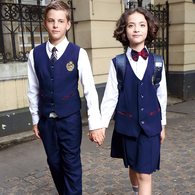 Los uniformes escolares de los diseños libres modificaron el delantal azul marino modificado para requisitos particulares de la escuela del muchacho y de las muchachas